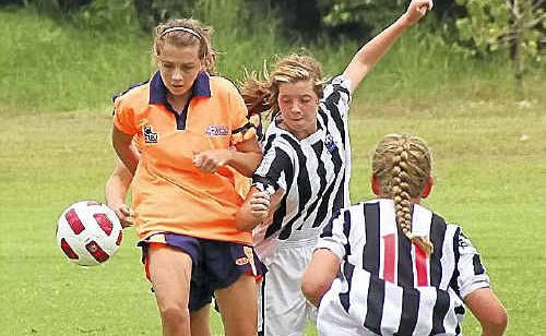 North Coast’s Brontie Barrera beats her Mid North Coast rivals to the ball during their clash at the weekend. North Coast’s Brontie Barrera beats her Mid North Coast rivals to the ball during their clash at the weekend.